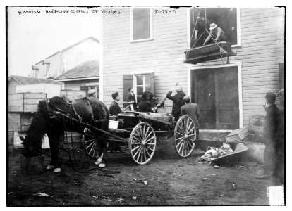Rimouski - handling coffins of victims LCCN2014696144