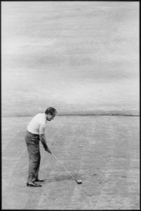 Richard M. Nixon playing golf - NARA - 194685