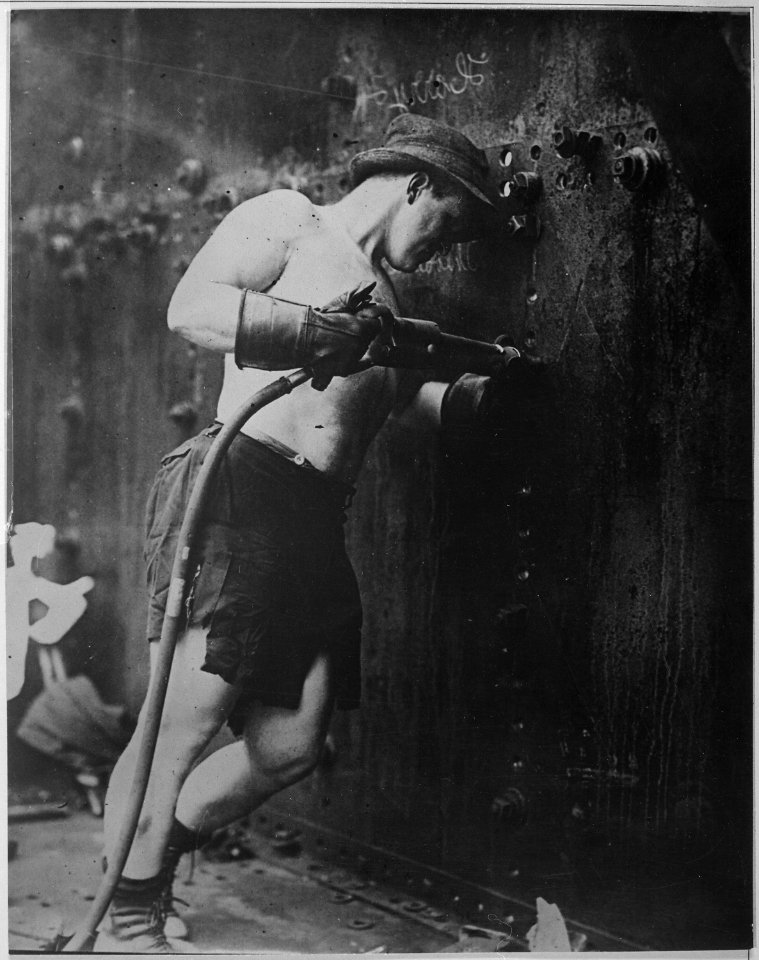 Riveter at work at Hog Island Shipyard. Pennsylvania, 1918. Kadel & Herbert., 1917 - 1919 - NARA - 533745