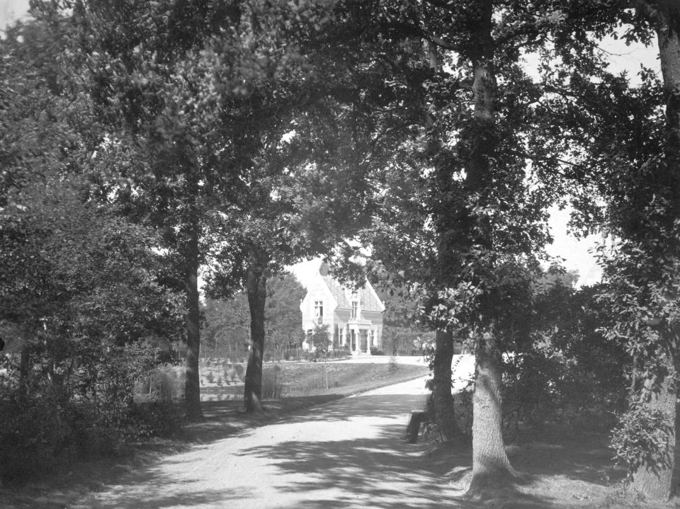 Road leading to a stone cottag