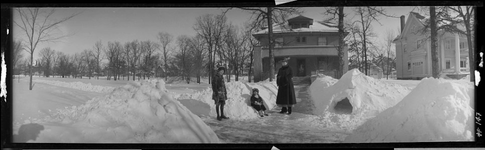 Robert V. Price with his snow house, Douglas Avenue, Elgin, Illinois LCCN2017656442