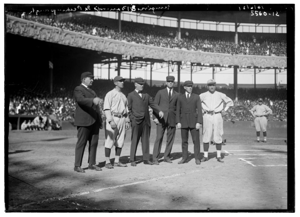 Roger Peckinpaugh, New York, AL (left), and Dave Bancroft, New York, NL (right), with umpires at Polo Grounds, World Series, 1921 (baseball) LCCN2014713341