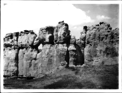 Rock walls of Mesa Encantada upon which the Acoma Pueblo sits concealed from view, ca.1900 (CHS-4507)