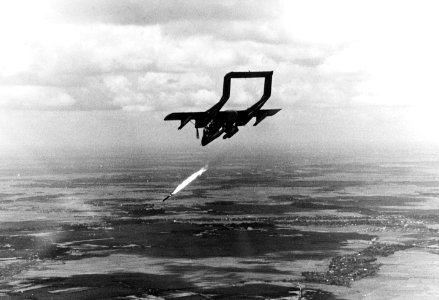 Rockwell OV-10A Bronco of VAL-4 attacks a target in the Mekong Delta, Vietnam, with a Zuni rocket, in June 1969 (USN 1139900)