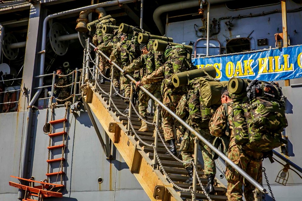 Romanian 307th Naval Infantry Battalion embarks with 26th MEU Marines aboard USS Oak Hill (28648548168)