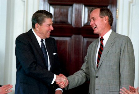 Ronald Reagan meeting with George H. W. Bush in the Cabinet Room photo