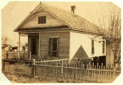 Rommel home, 430 N. Loomis St., Ft. Collins, Colo. Home boarded up for six months this year while family lived in the little shack shown in 4040. LOC nclc.00364