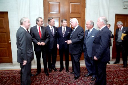 Ronald Reagan and George H. W. Bush meet with Congressional leaders after their inaugural ceremony in 1985 photo