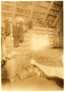Room 75, Shanty 4, Cranberry pickers Paulo Biniristo and wife live here. Settlement called Rome, on Whites Bog, Browns Mills, N.J. 4 sons live in next room. Note the bread and other food LOC nclc.05453