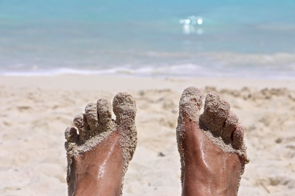 Foot barefoot sand beach