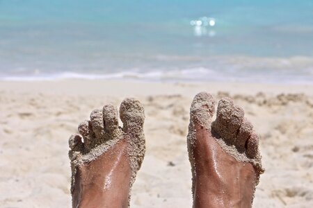 Foot barefoot sand beach photo