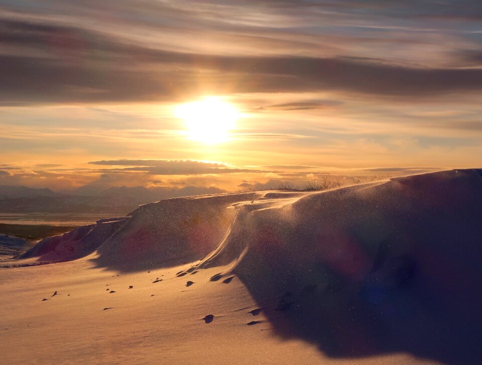 Snowdrifts shadow landscape