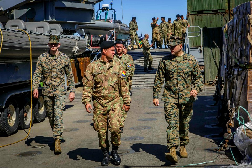 Romanian 307th Naval Infantry Battalion embarks with 26th MEU Marines aboard USS Oak Hill (42470355562)
