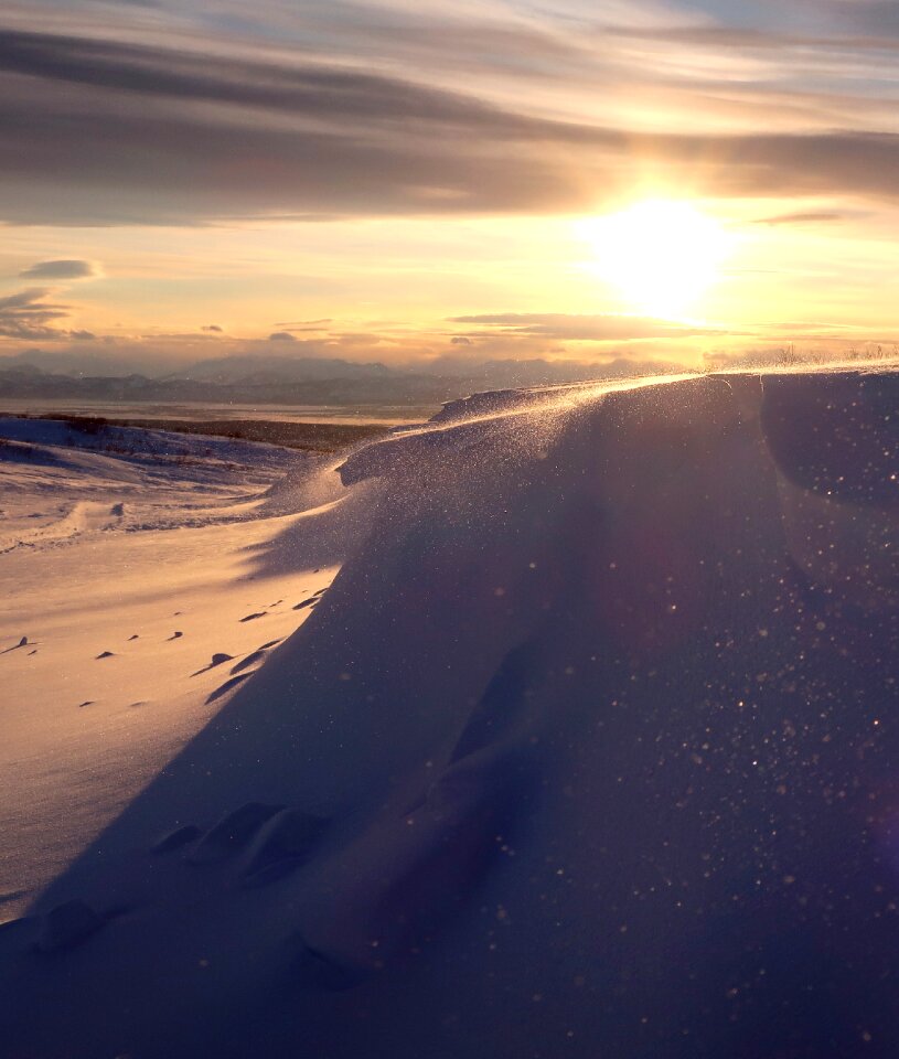Snowdrifts shadow landscape