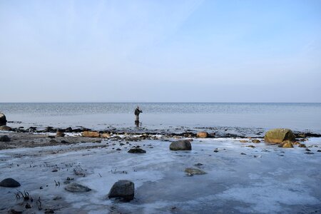 Beach angler ice photo