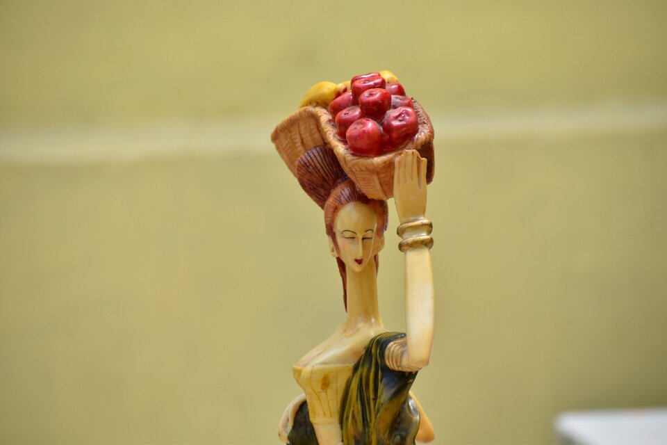 Fruit seller woman statue