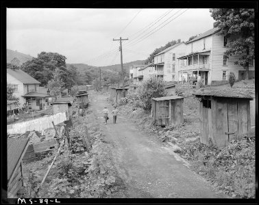 Rows of privies along alley in company housing project. Koppers Coal Division, Federal ^1 Mine, Grant Town, Marion... - NARA - 540266