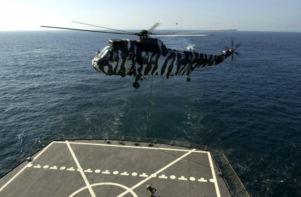 Royal Marines fast rope from Sea King to USNS Pecos (T-AO-197) 2002