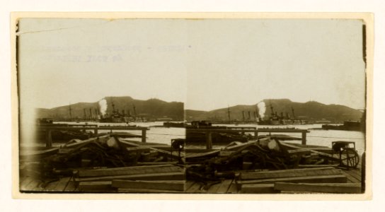 Russia's fleet lying under great Golden Hill forts, being sunk by Japanese shells - Port Arthur LCCN2005678344