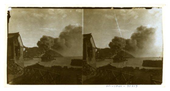 Russian warships in harbor; in background smoke from a fire near Golden Hill started by Japanese bombardment, Port Arthur LCCN2005678600