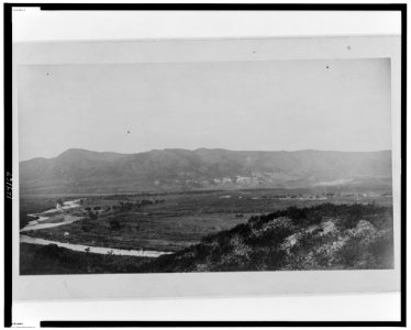 Ruins of village No. 20, south side, with the Verde River and Fort Verde shown in the distance LCCN99471775