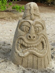 Face sand sculpture vacations
