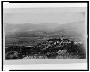 Ruins of village No. 20, from the southeast, with the Verde River and Fort Verde shown in the background LCCN99471776
