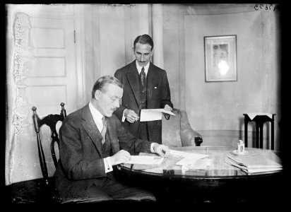 S. Yousry Pasha, seated, the 1st Egyptian Rep. Standing is A.M. Hassanein Bey, 1st Secy. to the Legation, who is well known on the continent as an explorer LCCN2016887055