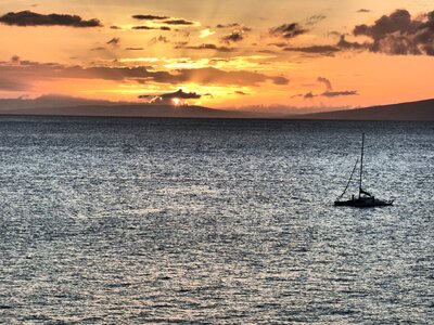 Sunset boat ocean photo