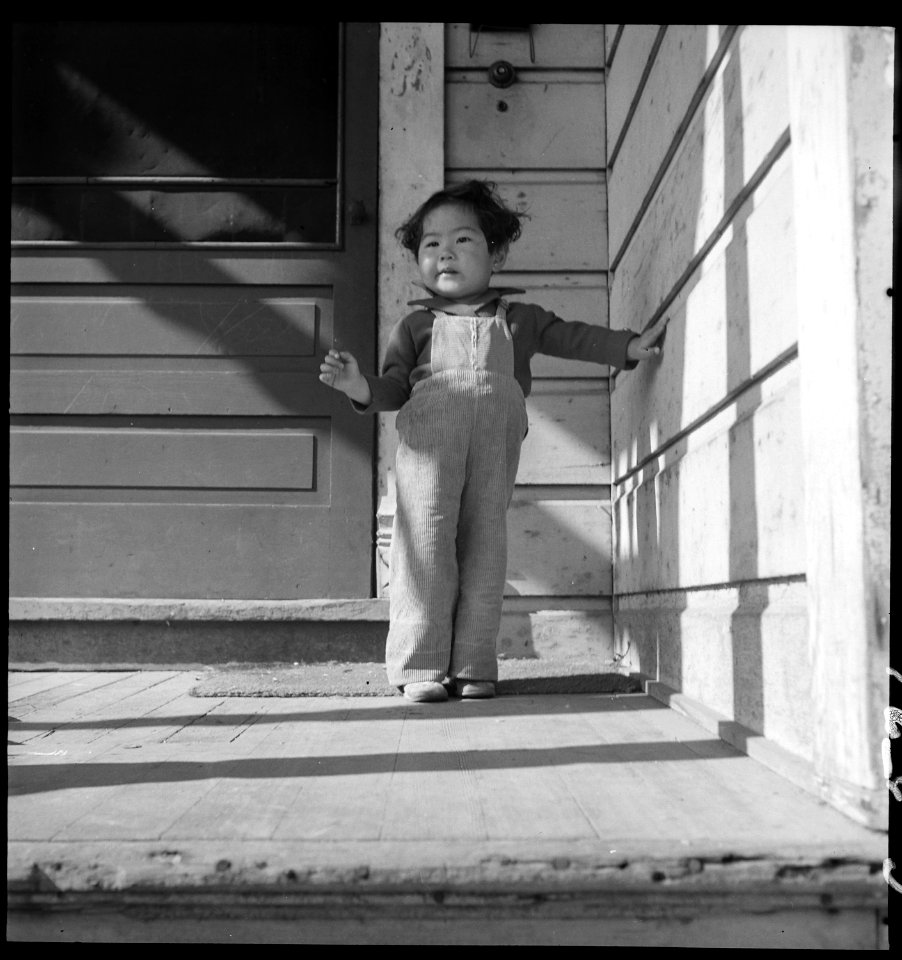 Sacramento, California. Child of Japanese ancestry on porch of home two days before evacuation of r . . . - NARA - 537881