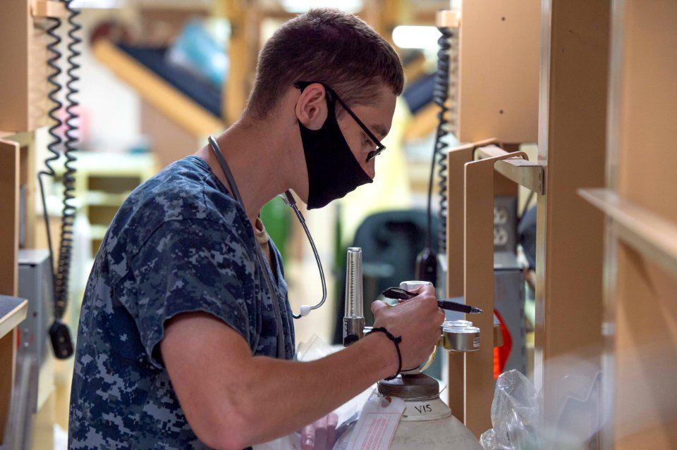 Sailor Checks Oxygen Tank (49777456663)