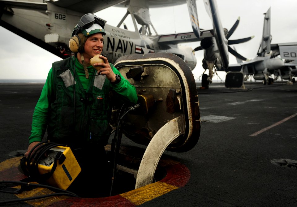 Sailor relays instructions aboard USS Nimitz. (8725564483)
