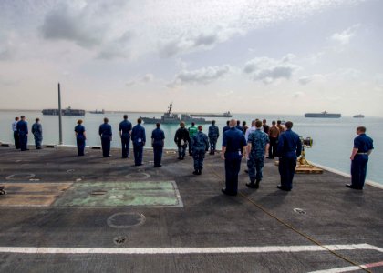 Sailors aboard USS Dwight D. Eisenhower render honors to USS Jason Dunham. (8573733463)
