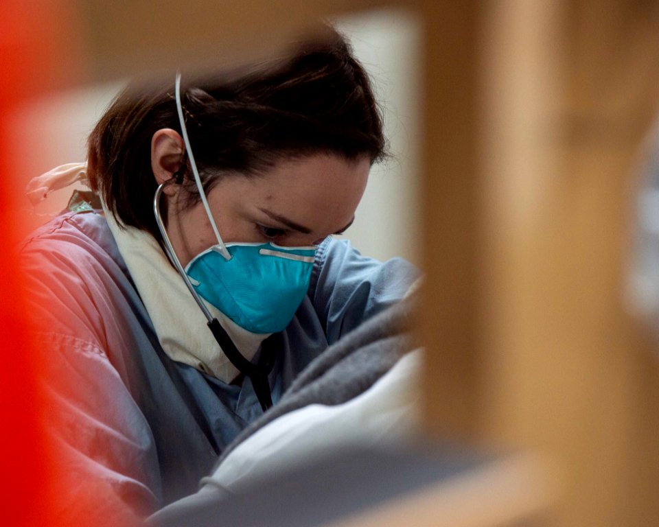 Sailor Checks Patient’s Vitals (49777456613)