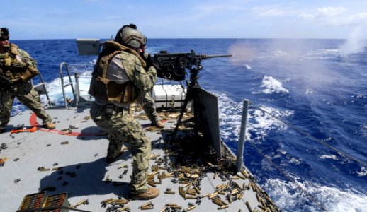 Sailor fires an M2 machine gun during a crew-served weapons qualification. (41497996721)