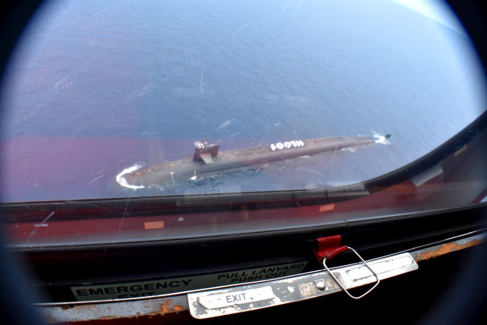 Sailors assemble topside to commemorate the submarine’s 100th patrol. (35278653972)
