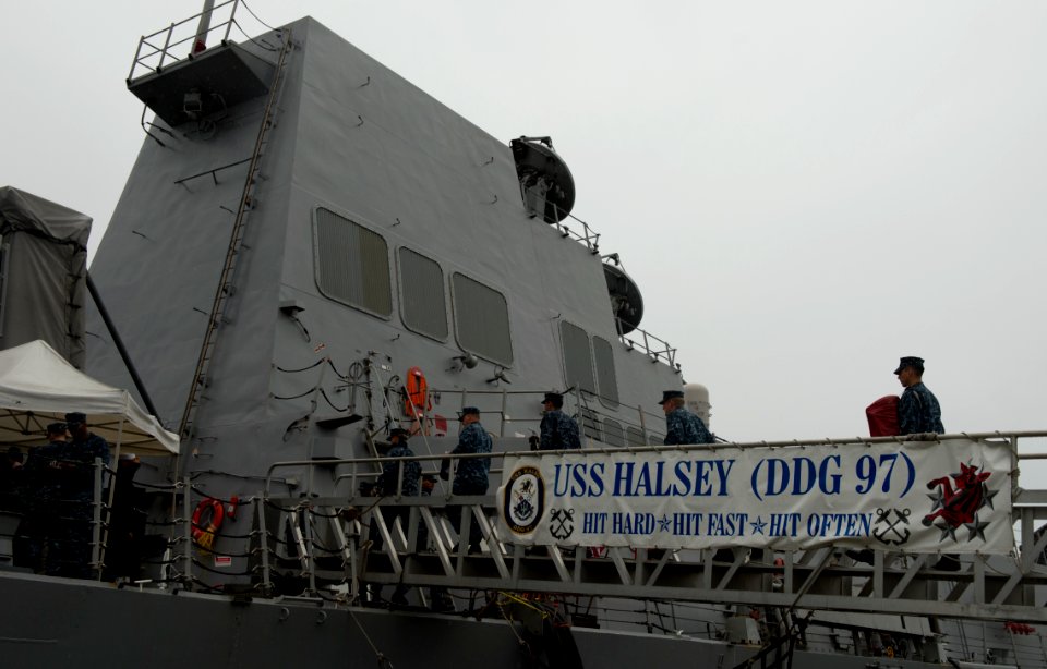 Sailors board USS Halsey. (8428933083)