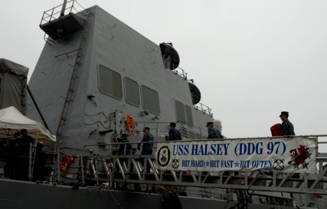 Sailors board USS Halsey. (8428933083)