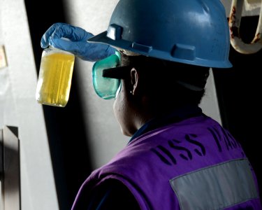 Sailor tests fuel quality 140329-N-HB951-170
