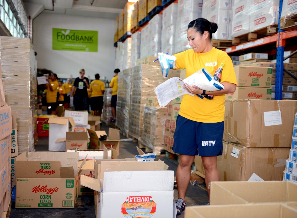 Sailors conduct community service project at The Food Bank Singapore 141105-N-YU572-211