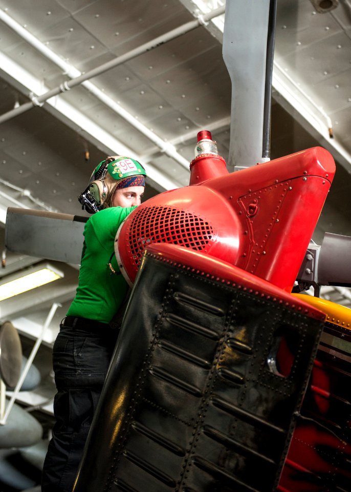 Sailors conduct MH-60S Seahawk maintenance aboard USS Carl Vinson 150304-N-FT110-121
