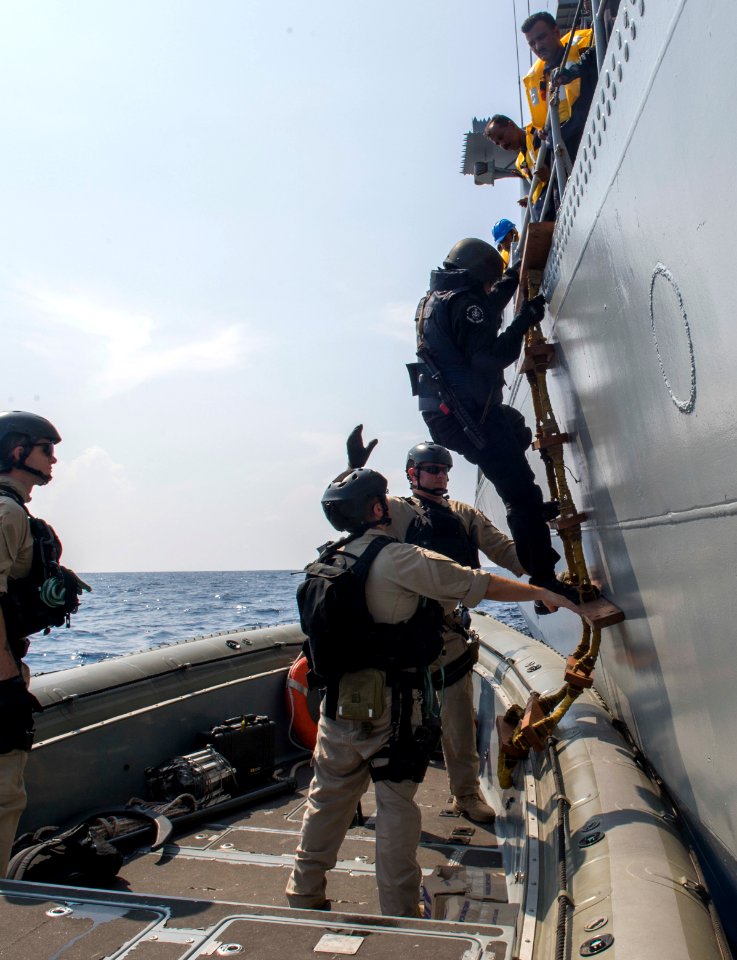 Sailors assigned to Surface Warfare Mission Package, Detachment 4, embarked aboard the USS Fort Worth train with the Indian Navy during a visit, board, search and seizure