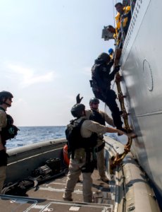 Sailors assigned to Surface Warfare Mission Package, Detachment 4, embarked aboard the USS Fort Worth train with the Indian Navy during a visit, board, search and seizure
