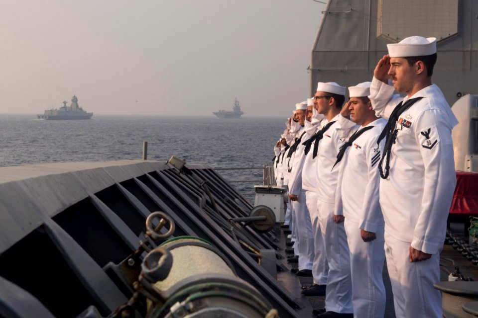 Sailors assigned to the Ticonderoga-class guided-missile cruiser USS Antietam (CG 54) render honors to a column of Indian naval vessels to mark the conclusion of India’s International Fleet Review (IFR) 2016
