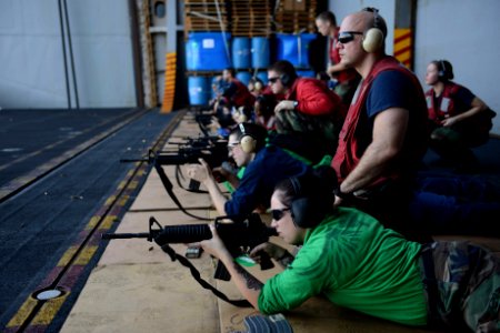 Sailors fire M16s at sea. (8202184639)