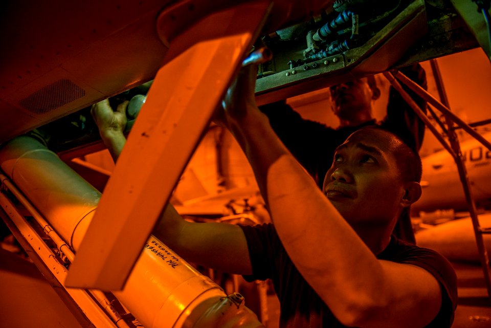 Sailors conduct aircraft maintenance aboard USS Carl Vinson 150212-N-TP834-198