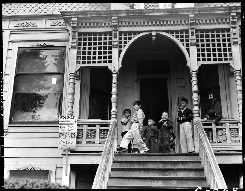 Sacramento, California. Children of Japanese ancestry play on the front porch of their home two day . . . - NARA - 537878