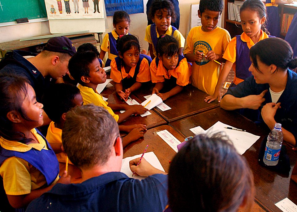 Sailors interact with students at elementary school DVIDS55377