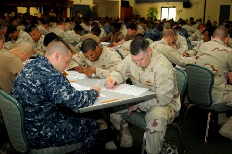 Sailors from Naval Station Guantanamo Bay and Joint Task Force Guantanamo take the Navy-wide first class petty officer advancement examination DVIDS374080