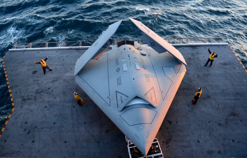 Sailors move an X-47B. (8738267501)